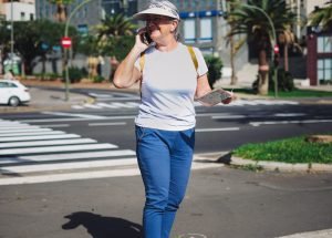 active-elderly-tourist-woman-casual-dressed-holdin-2025-04-14-01-36-29-utc